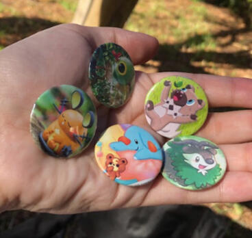 Pins made from Pokemon cards